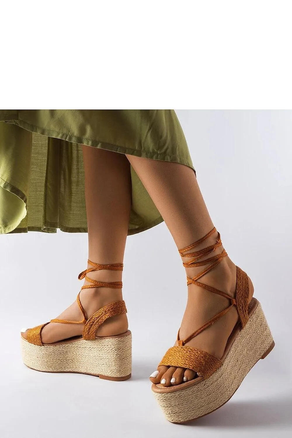 Brown espadrilles on the platform