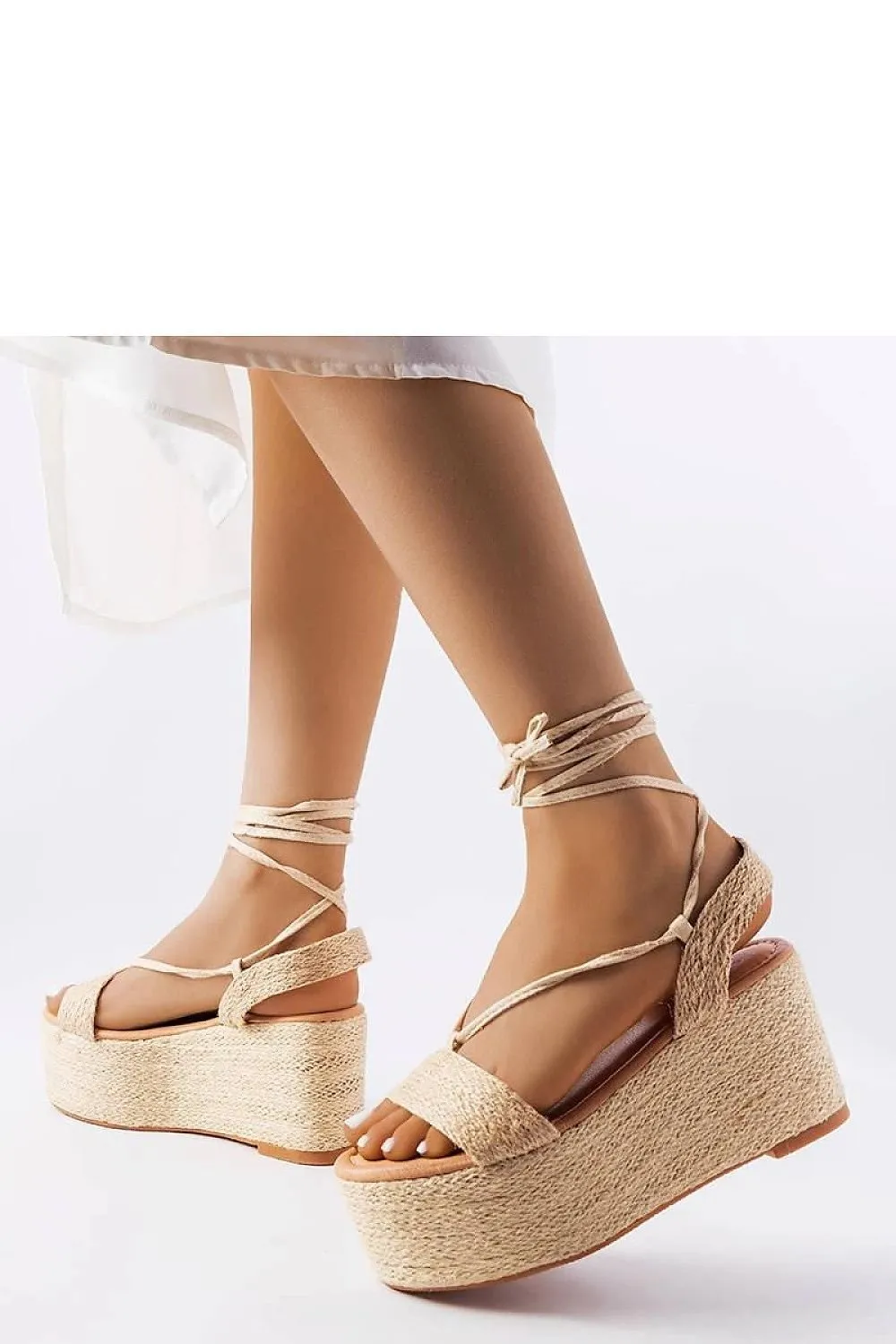 Brown espadrilles on the platform