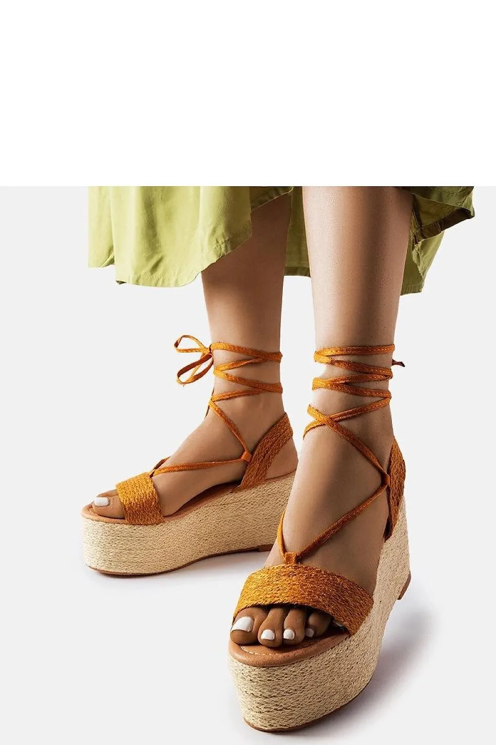 Brown espadrilles on the platform