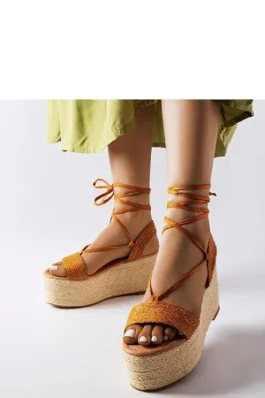 Brown espadrilles on the platform